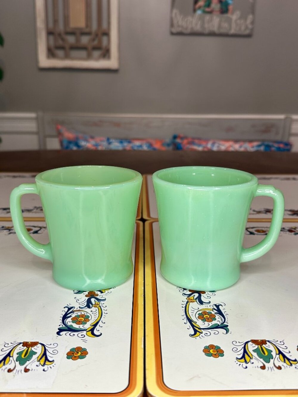 set of 2 vintage Fire-King jadeite coffee mugs featuring classic D-shaped handle